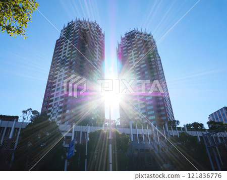 The sun peeking through the apartment towers | Odaiba The sun peeking through the apartment towers | Odaiba 121836776