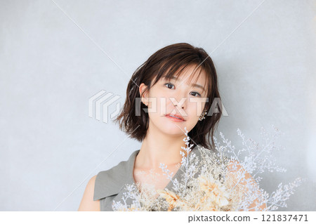 Woman with a bouquet Woman with a bouquet 121837471