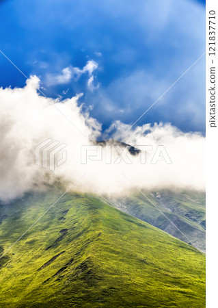 Peaks above the clouds Peaks above the clouds 121837710