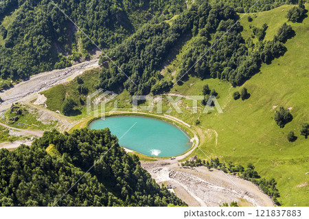 A beautiful round lake A beautiful round lake 121837883