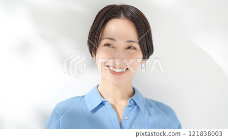 A woman with a smile A woman with a smile 121838003