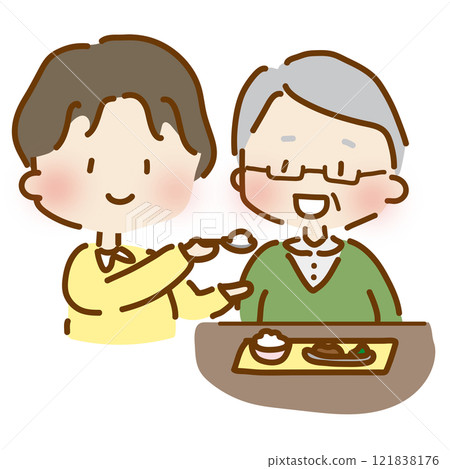 A cute and relaxed male caregiver helping with meals 1 A cute and relaxed male caregiver helping with meals 1 121838176