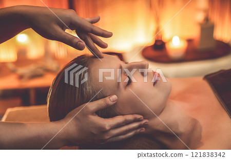 Caucasian woman enjoying relaxing anti-stress head massage. Quiescent 121838342