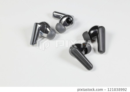 Variety of Bluetooth Wireless earphone or earbud or headphone, isolated on white background. 121838992