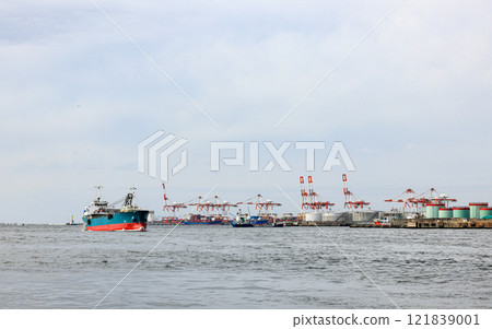 Cargo transportation and activity at modern shipping container terminal. 121839001