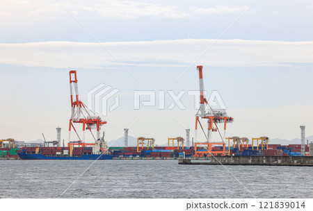 Cargo transportation and activity at modern shipping container terminal. Cargo transportation and activity at modern shipping container terminal. 121839014
