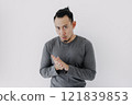 Cold man in grey fleece base layer stand chilling isolate on white. 121839853