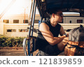 Man tourist backpacker ride auto rickshaw or Tuk Tuk in Thailand. 121839859