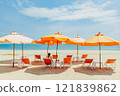Woman sit on the orange umbrella chair set on the beach with blue sky. 121839862
