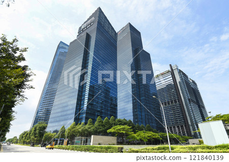 Building view of the Marina Bay Financial Centre in Singapore, is a mixed-use development located along Marina Blvd and Central Blvd within the Downtown Core of Singapore. Building view of the Marina Bay Financial Centre in Singapore, is a mixed-use development located along Marina Blvd and Central Blvd within the Downtown Core of Singapore. 121840139