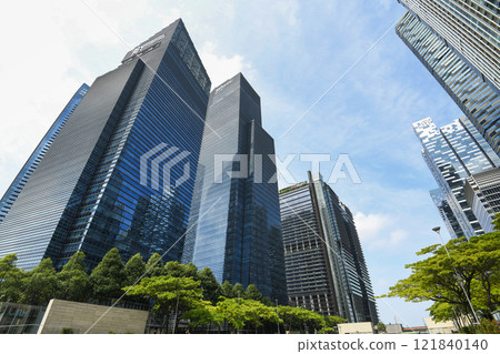 Building view of the Marina Bay Financial Centre in Singapore, is a mixed-use development located along Marina Blvd and Central Blvd within the Downtown Core of Singapore. Building view of the Marina Bay Financial Centre in Singapore, is a mixed-use development located along Marina Blvd and Central Blvd within the Downtown Core of Singapore. 121840140