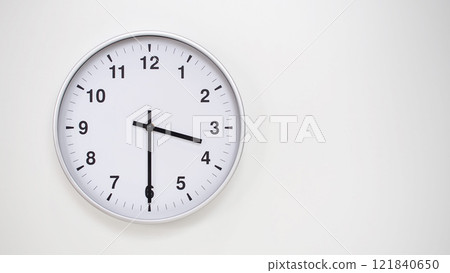 Minimalist White Clock with Silver Frame Striking 15.30/03.30 on White Background. Perfect for Time Management and Corporate Campaigns Minimalist White Clock with Silver Frame Striking 15.30/03.30 on White Background. Perfect for Time Management and Corporate Campaigns 121840650