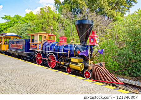 Ride train in an amusement park. Ride train in an amusement park. 121840807