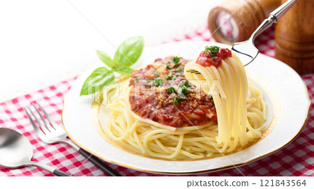 Lift the meat spaghetti with a fork Lift the meat spaghetti with a fork 121843564
