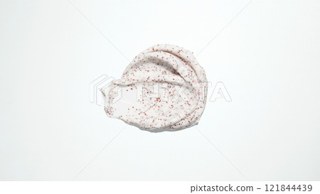 Cosmetic smear. Smears of body scrub. Fruit and berry body scrub texture of swatch Cosmetic smear. Smears of body scrub. Fruit and berry body scrub texture of swatch 121844439