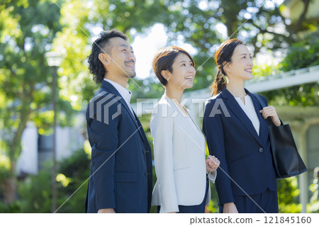 Business people walking in the business district Business people walking in the business district 121845160