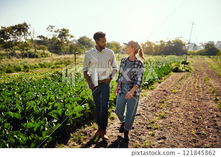 Agriculture manager and farmer meeting, talking and discussing while walking on a farm outside. Planning strategy for harvest season in an eco friendly, organic and sustainable farming industry Agriculture manager and farmer meeting, talking and discussing while walking on a farm outside. Planning strategy for harvest season in an eco friendly, organic and sustainable farming industry 121845862