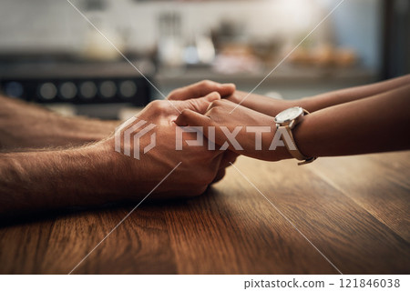 Couple holding hands in love, support and care during difficult times, grief or sad loss. People hand touching together showing empathy, compassion and comfort after receiving bad news with a closeup Couple holding hands in love, support and care during difficult times, grief or sad loss. People hand touching together showing empathy, compassion and comfort after receiving bad news with a closeup 121846038