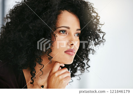 Beautiful, stunning and attractive female fashion designer thinking in a busy workshop or studio. Closeup of a young fashion creative contemplating and thoughtful while sitting inside an office Beautiful, stunning and attractive female fashion designer thinking in a busy workshop or studio. Closeup of a young fashion creative contemplating and thoughtful while sitting inside an office 121846179