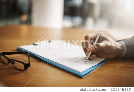 Lawyer hand showing paperwork for signing, agreement contract and settlement offer in law firm office. Closeup of legal advisor, attorney and paralegal pointing with pen to accept or close court case Lawyer hand showing paperwork for signing, agreement contract and settlement offer in law firm office. Closeup of legal advisor, attorney and paralegal pointing with pen to accept or close court case 121846187