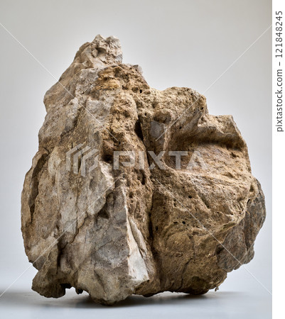 Close-Up Of a big Rock Against White Background Close-Up Of a big Rock Against White Background 121848245