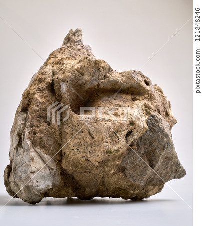 Close-Up Of a big Rock Against White Background 121848246