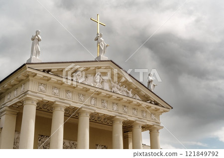 VILNIUS, LITHUANIA - May 23, 2022: Cathedral Basilica sculptures. VILNIUS, LITHUANIA - May 23, 2022: Cathedral Basilica of St Stanislaus and St Ladislaus on the Cathedral Square against the blue sky 121849792