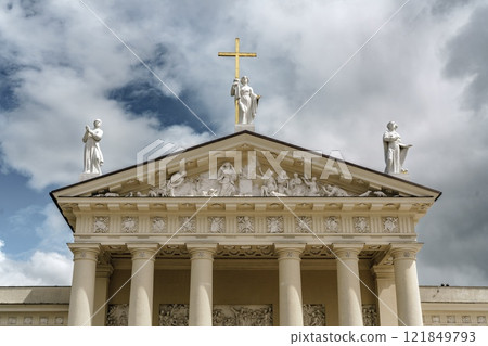 VILNIUS, LITHUANIA - May 23, 2022: Cathedral Basilica sculptures. VILNIUS, LITHUANIA - May 23, 2022: Cathedral Basilica of St Stanislaus and St Ladislaus on the Cathedral Square against the blue sky 121849793
