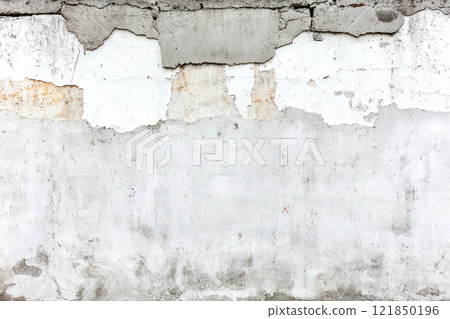 Textured wall with peels and stains, showcasing an urban architecture detail. Textured wall with peels and stains, showcasing an urban architecture detail. 121850196