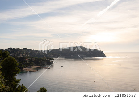 Aerial view of peaceful coastal landscape near Nice, France, with serene waters and distant hills. Concept of Mediterranean tranquility, nature, and scenic beauty. Luxury travel vacation destinations. 121851558