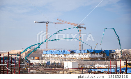 Construction machineries at construction site 121852118