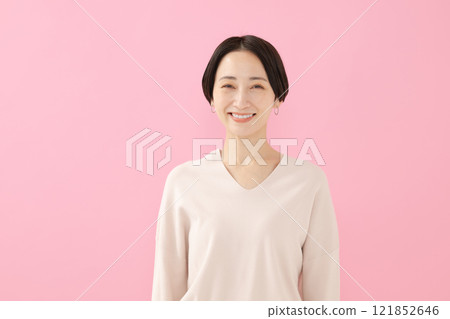 A smiling middle woman A smiling middle woman 121852646
