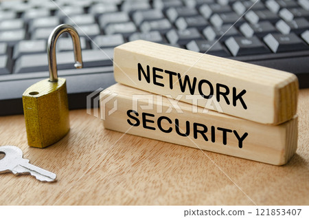 Network Security text on wooden blocks with locker pad and keyboard background. 121853407