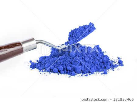 Cobalt Blue, ultramarine pigment, dry paint on a white background, macro 121853466