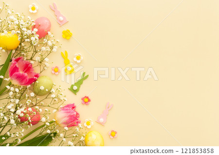 Easter eggs with tulips and gypsophila 121853858
