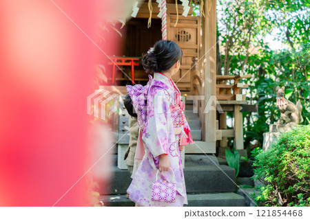 A 5-year-old girl visits a shrine for the Shichigosan festival with her younger brother A 5-year-old girl visits a shrine for the Shichigosan festival with her younger brother 121854468
