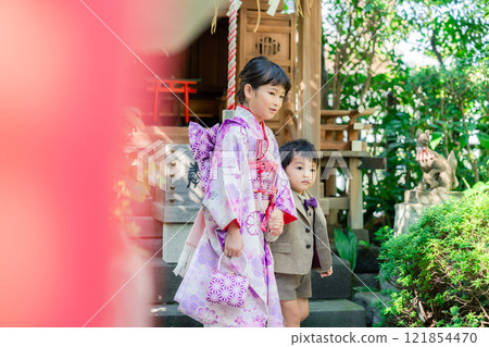 A 5-year-old girl visits a shrine for the Shichigosan festival with her younger brother A 5-year-old girl visits a shrine for the Shichigosan festival with her younger brother 121854470