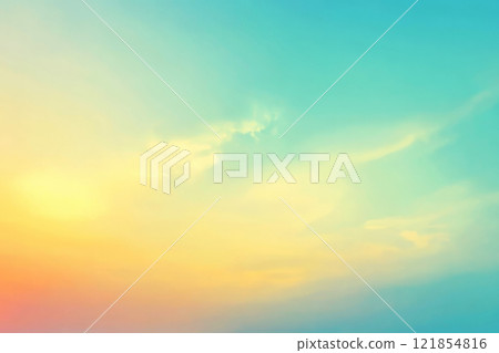 A smooth, blurred gradient flows from light pink to baby blue, yellow, and green. The pastel colors create a serene, dreamy feel with a soft, airy effect 121854816