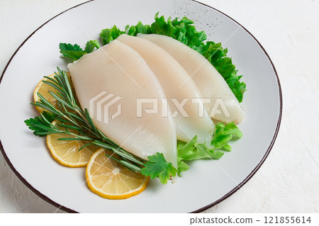 Fresh body, squid, raw, three carcasses, top view, no people , on a plate, 121855614