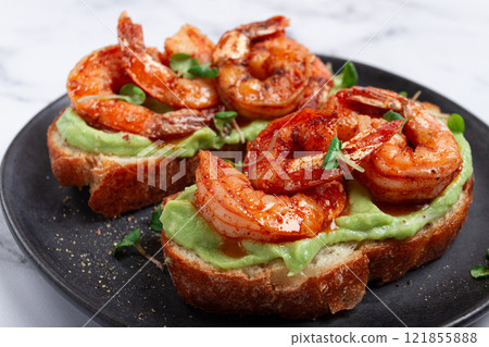 sandwiches with avocado and caramelized shrimp, micro-greens, breakfast, on a plate, top view, homemade, no people, sandwiches with avocado and caramelized shrimp, micro-greens, breakfast, on a plate, top view, homemade, no people, 121855888