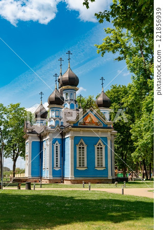 A very old historic blue church in Druskininkai. Orthodox Joy of All Who Sorrow church at the center of Druskininkai, Lithuania. 121856939