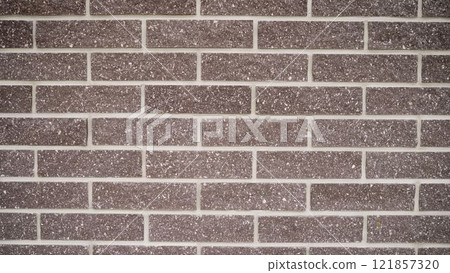 Beautiful background of tiles of different white, black, brown colors. Tiles brown and white on the foundation of the house. Beautiful background of tiles of different white, black, brown colors. Tiles brown and white on the foundation of the house. 121857320