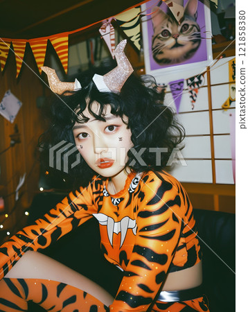 Asian woman in tiger demon costume 121858380