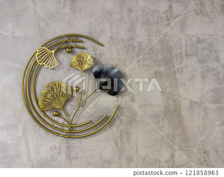 Wall Decor Featuring Metallic Ginkgo Leaves and Abstract Shapes in Modern Design 121858963