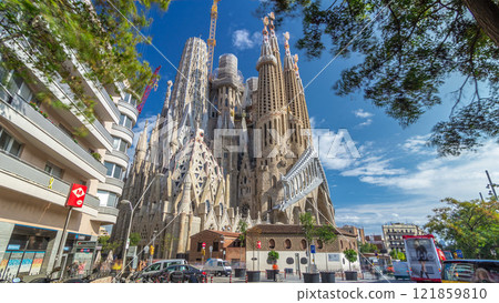 Sagrada Familia, a large Roman Catholic church in Barcelona, Spain timelapse hyperlapse 121859810