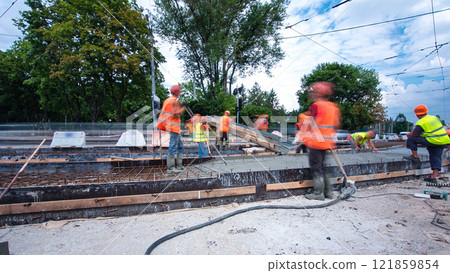 Road construction site with tram tracks repair and maintenance timelapse hyperlapse. Road construction site with tram tracks repair and maintenance timelapse hyperlapse. 121859854