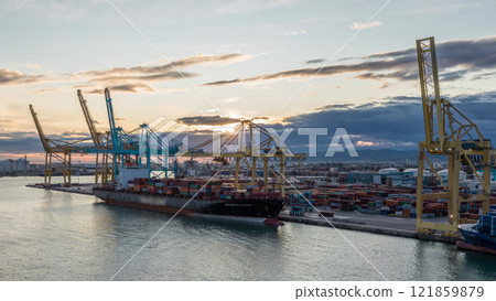 Aerial view of the sea cargo port and container terminal of Barcelona timelapse, Barcelona, Catalonia, Spain. 121859879