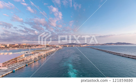 Aerial view of sea with waves and port from ship sailing in the open sea timelapse 121859880