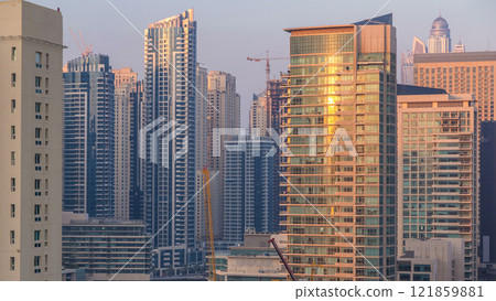 Aerial view of Dubai Marina from a vantage point at sunset timelapse. Aerial view of Dubai Marina from a vantage point at sunset timelapse. 121859881
