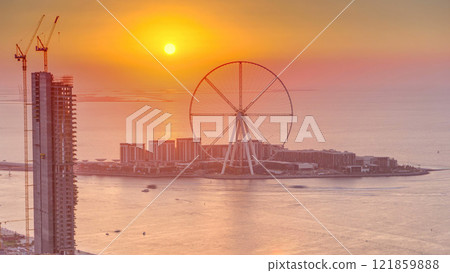 Bluewaters island at sunset aerial timelapse with ferris wheel Bluewaters island at sunset aerial timelapse with ferris wheel 121859888